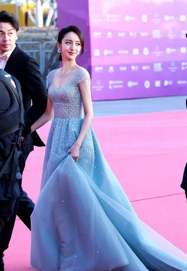 Cap sleeves crystals handmade beaded dusty blue prom dress on the red carpet